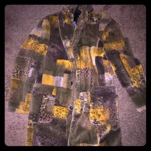 100% lamb coat. Retail price 499.99 from Macy’s